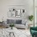 a living room with a couch chair and a table